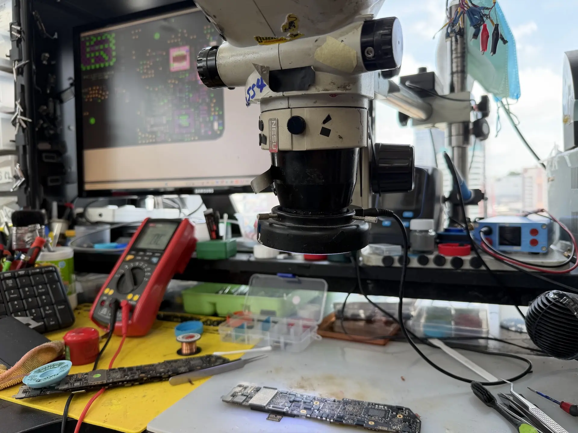 Dr. MacBook repair workbench in Bangkok